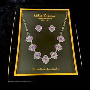 One 18.5” (with extender) necklace, One pair of earrings